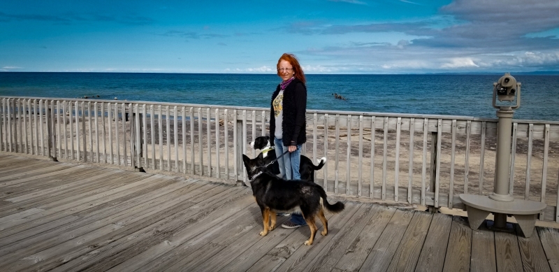 Shelli and dogs on the pier